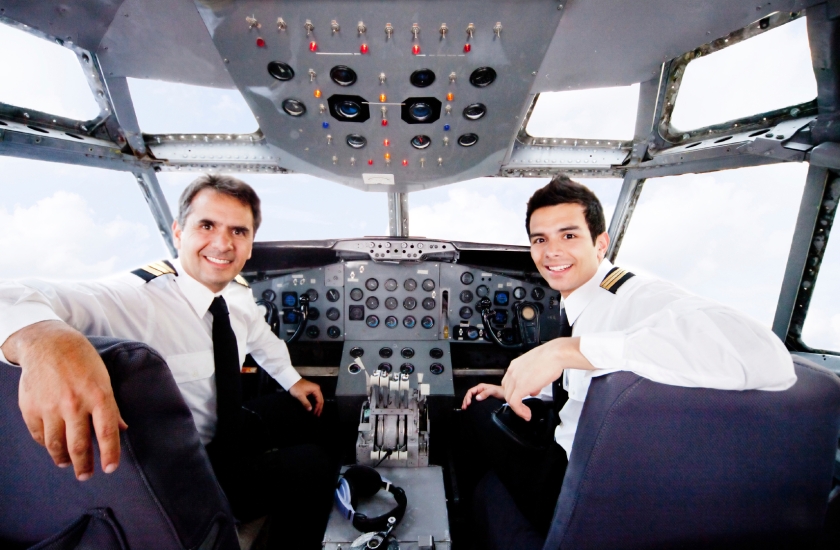 Pilots in an airplane cabin